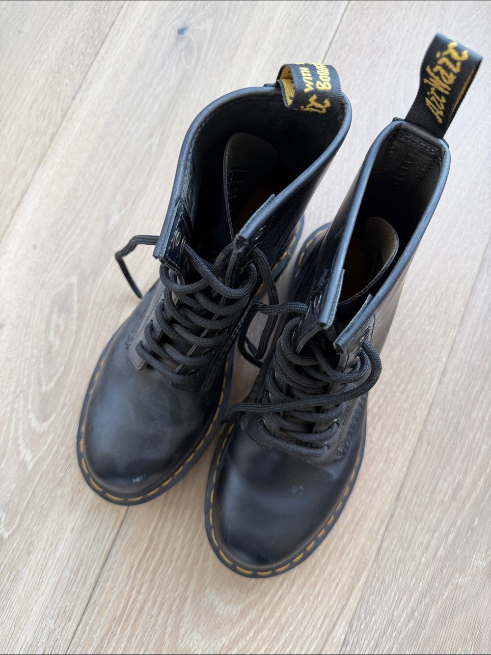 Dr. Martens Black Leather Combat Boots with Yellow Stitching